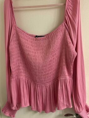 Smocked Peplum Blouse in Pink with Long Sleeves